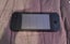 NEAR NEW condition Nintendo Switch - black vinyl & comes with case Carousel 4