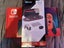 NEAR NEW condition Nintendo Switch - black vinyl & comes with case Carousel 11