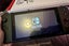 NEAR NEW condition Nintendo Switch - black vinyl & comes with case Carousel 9