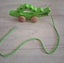 Hape baby toy wooden crocodile pull along Carousel 1
