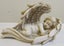 Sleeping cherub, head to right Carousel 1
