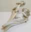 Sleeping cherub, head to right Carousel 2