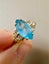 Elegant solid 9ct/9k yellow gold & blue topaz ring Carousel 1
