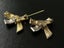 Vintage pave set pair Bow brooches 2 tone GP Carousel 2