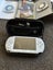 PSP E1002 with 11 games and case Carousel 8