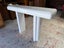 A Mid Century White Lacquer Console or Hallway Table Carousel 19