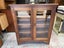 A Vintage Solid Teak Glass Fronted Bookcase or Display Case Carousel 16