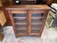A Vintage Solid Teak Glass Fronted Bookcase or Display Case Carousel 18