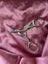 pair of stork embroidery scissors, a common tool in sewing and needlework. Carousel 2