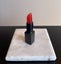 Lipstick sculpture carved in black jade and fibre optic Carousel 7