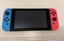Nintendo Switch Console + Extra Controllers and Cases Carousel 1