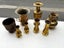 9 x brass coloured vases/ urns: various shapes/ styles incl two pairs (2174AP) Carousel 1