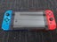 NINTENDO Switch Console (HAC-001(01) + Joycon Grip, Dock and Charger Carousel 3