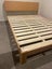 Brand New Queen bed frame only. Solid wood Carousel 3