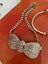 Rhinestone covered bow tie necklace & gold tone bracelet Carousel 2
