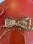 Rhinestone covered bow tie necklace & gold tone bracelet Carousel 4
