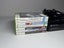Xbox 360 E (500 GB) + 7 Games + Controllers Carousel 3