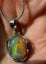 Natural Ethiopian Opal Pendant in Sterling Silver setting and chain Carousel 3