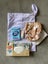 Baby Gift Pack - Nappy bag + Newborn Essentials Carousel 1