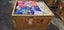 $1 = RES Wooden crate #53 assorted material, possibly linen etc Carousel 1
