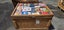 $1 = RES Wooden crate #62 assorted books Carousel 1