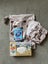Baby Gift Pack - Nappy bag + Newborn Essentials Carousel 1