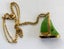 GILT AND POUNAMU YACHT NECKLACE Carousel 1