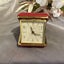 Vintage Equity travelling alarm clock winding action working Carousel 1
