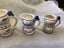 Arnart Blue onion measuring cups 1920s some repairs Carousel 4
