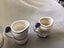 Arnart Blue onion measuring cups 1920s some repairs Carousel 11