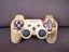 PS3 GOD OF WAR CONTROLLER + 2 STANDARD BLACK CONTROLLERS Carousel 1