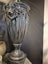 Large black loin detailed urn Carousel 6