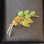 Gold tone greenstone brooch Carousel 3
