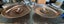 Matching Copper Dishes on Wooden Stands Carousel 1