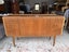 A 'Greaves & Thomas' Mid Century Modern Rosewood Sideboard or Home Bar cabinet Carousel 16
