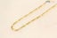 14ct Yellow Gold Figaro Chain Carousel 1