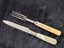 Antique Bone Handled Prong Fork and Pearl Handled Knife Carousel 3