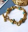 Beaded turquoise colored with cuban link chain Carousel 1