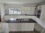 $1 Reserve Granite natural stone polished finish with sink and hob Carousel 1