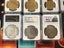 SILVER AND GOLD COINS IN PLASTIC CASES Carousel 7
