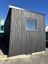 Charred architectural cabin Carousel 1