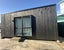 Charred architectural cabin Carousel 5