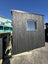 Charred architectural cabin Carousel 9