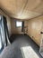 Charred architectural cabin Carousel 11