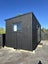 Charred architectural cabin Carousel 18