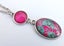 Green Leaves on Hot Pink Double Oval Silver Tone Dome Pendant Carousel 1