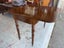 A Quality Marquetry Inlay Swivel Top Solid Walnut Games Table Carousel 4
