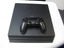 PS4 Pro model CUH-7202B with controller Carousel 1