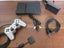 Sony PS2 Slim – PlayStation 2 Slim, Controller and Cables Carousel 1
