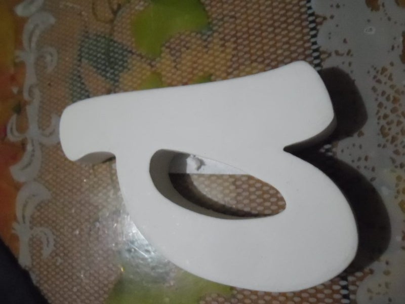 "d" - Small Wooden Letter Carousel 1